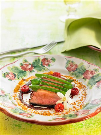 simsearch:825-07522758,k - Caramelized duck carpaccio with sugar peas and raspberries Stock Photo - Rights-Managed, Code: 825-06815860