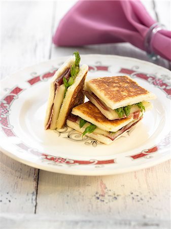 simsearch:652-03801435,k - Raw ham,asparagus and melted cheese toasted sandwiches Stock Photo - Rights-Managed, Code: 825-06815937