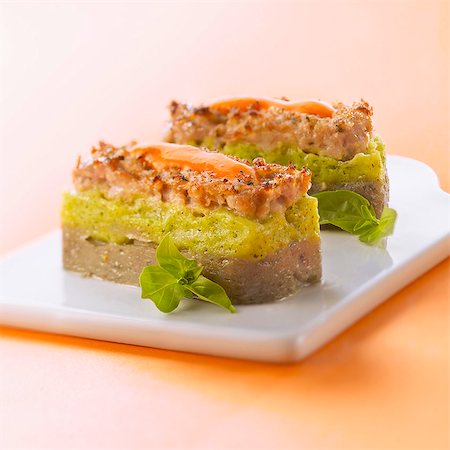 simsearch:825-06815809,k - Eggplant and zucchini puree and stuffing savoury log cakes with red pepper sauce Photographie de stock - Rights-Managed, Code: 825-06816035