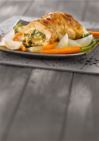 Veal stuffed with Camembert,herb and hazelnut sauce Stock Photo - Rights-Managed, Code: 825-06816040