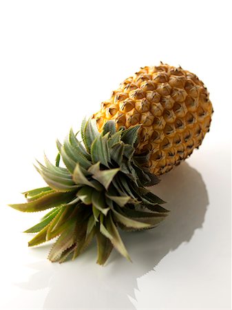 picture of pineapple - Pineapple on it's side Stock Photo - Rights-Managed, Code: 825-06816072