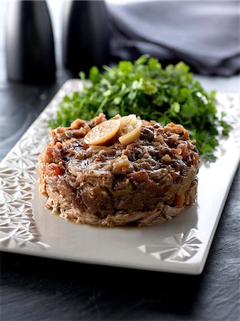 Lamb and dried fruit Tajine Timbale Stock Photo - Rights-Managed, Code: 825-06816086