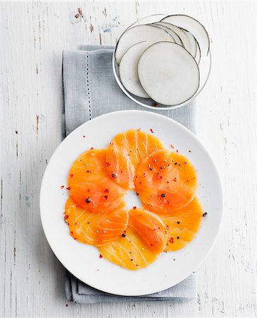 simsearch:825-06816656,k - Smoked salmon carpaccio with black radishes Photographie de stock - Rights-Managed, Code: 825-06816655