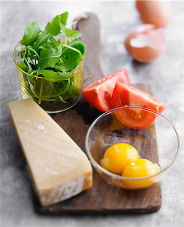 parmigiano reggiano - Parmesan,egg yolks,tomatoes and rocket lettuce Stock Photo - Rights-Managed, Code: 825-06816729