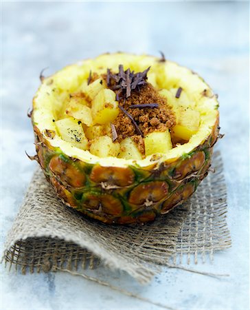 simsearch:652-06818682,k - Pineapple salad with crumbled Speculos and chocolate chips Photographie de stock - Rights-Managed, Code: 825-06816768