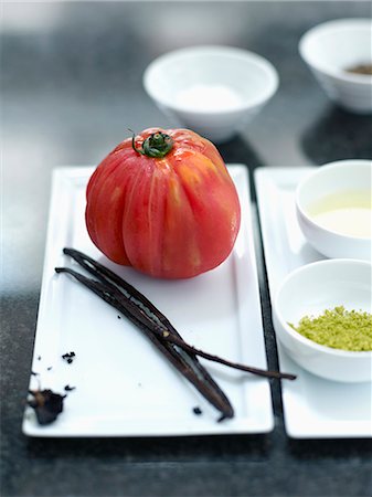 simsearch:825-05812193,k - Ingredients for sliced  tomato with vanilla-flavored olive oil and lime zests Photographie de stock - Rights-Managed, Code: 825-06817431