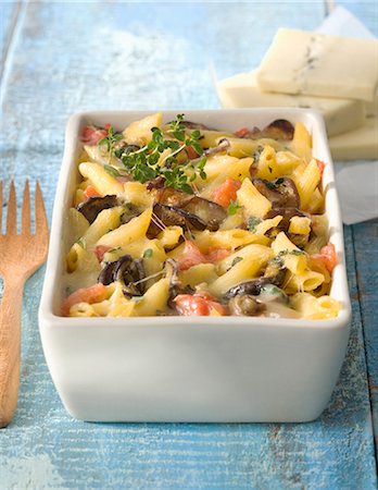 Pasta ,eggplant and Morbier cheese-topped dish Stock Photo - Rights-Managed, Code: 825-06817748