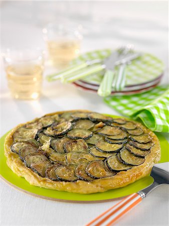 simsearch:652-03805193,k - Zucchini and Kiri cream cheese tatin tart Foto de stock - Con derechos protegidos, Código: 825-06817882