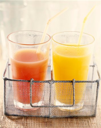 Glass of grapefruit juice and glass of orange juice Stock Photo - Rights-Managed, Code: 825-07075901