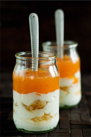 simsearch:652-07656423,k - Yoghurt with tangerine jam and almonds Stock Photo - Rights-Managed, Code: 825-07076459