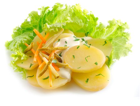 simsearch:825-07078203,k - Potato salad with thinly sliced carrots and gherkins Stock Photo - Rights-Managed, Code: 825-07076497