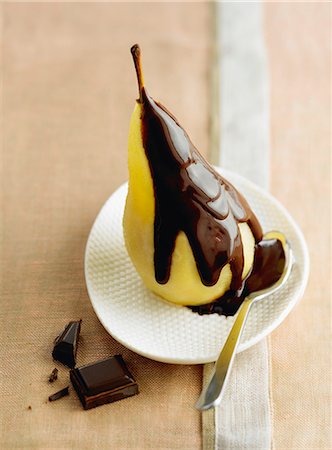 Poached pear with chocolate sauce Stock Photo - Rights-Managed, Code: 825-07076640