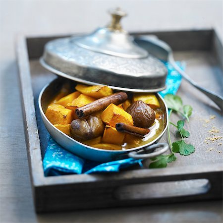 simsearch:825-06817574,k - Spicy pumpkin and chestnut Tajine Stockbilder - Lizenzpflichtiges, Bildnummer: 825-07076989