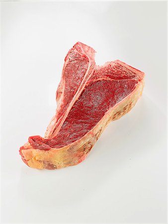 Raw T-bone steak Foto de stock - Con derechos protegidos, Código: 825-07077046