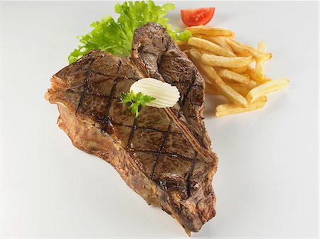 simsearch:825-07075866,k - Grilled T-bone steak and French fries Foto de stock - Con derechos protegidos, Código: 825-07077055