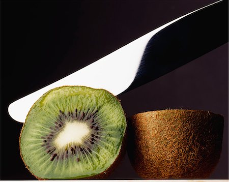 simsearch:652-07656119,k - Slicing a kiwi Stock Photo - Rights-Managed, Code: 825-07077135