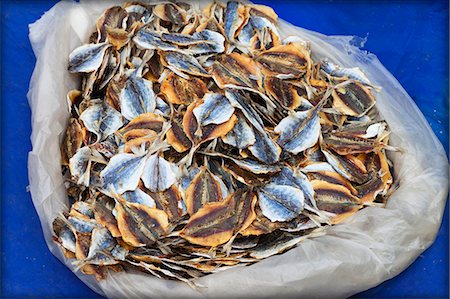 Dried fish on a stall at the market in Luang Prabang, Laos Foto de stock - Direito Controlado, Número: 825-07077175