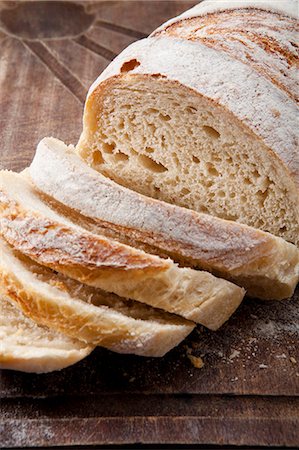 sliced bread - Slice bread loaf Foto de stock - Con derechos protegidos, Código: 825-07077203