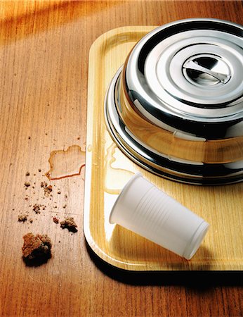 Spilt cup of water on a tray,plate and dome Stock Photo - Rights-Managed, Code: 825-07077256