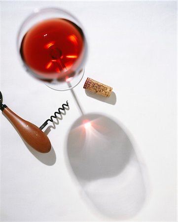 stemware - Glass of red wine,corkscrew and cork Stock Photo - Rights-Managed, Code: 825-07077408