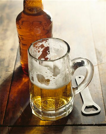 selective focus beer - Tankard and bottle of beer Stock Photo - Rights-Managed, Code: 825-07077409