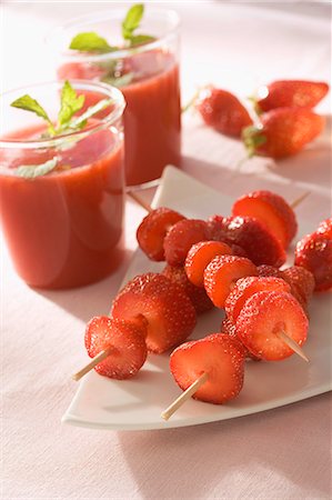 simsearch:825-06048104,k - Strawberry brochettes with strawberry soup Stock Photo - Rights-Managed, Code: 825-07077483