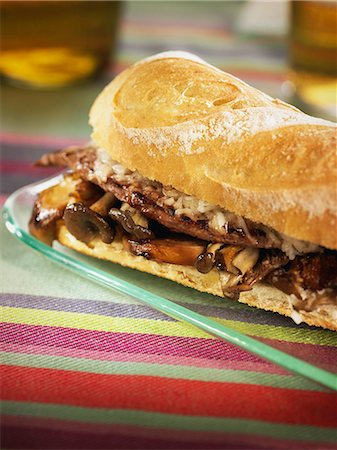 simsearch:652-07655870,k - Veal fillet,mushroom,onion and grated cheese sandwich Stock Photo - Rights-Managed, Code: 825-07077670