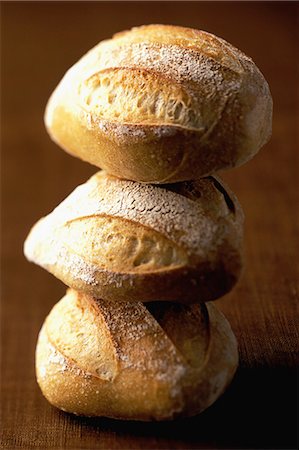 simsearch:825-05835883,k - Stack of small round bread loaves Stock Photo - Rights-Managed, Code: 825-07077871