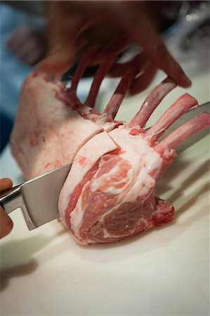 simsearch:825-07078253,k - Cutting lamb chops Foto de stock - Con derechos protegidos, Código: 825-07077907