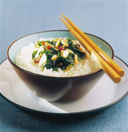 White rice with spinach,pine nuts,almonds and cranberries Stock Photo - Rights-Managed, Code: 825-07078187