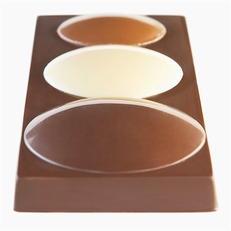 simsearch:825-02305030,k - Dark ,milk and white chocolate bar Foto de stock - Con derechos protegidos, Código: 825-07078362