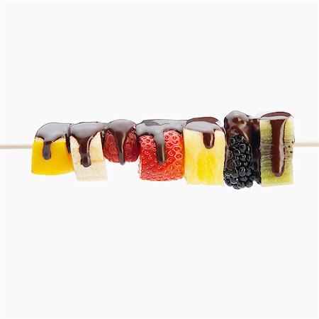 Fruit brochette with chocolate sauce Stock Photo - Rights-Managed, Code: 825-07078371