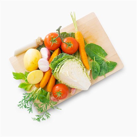simsearch:825-02303660,k - Raw vegetables on a cutting board Photographie de stock - Rights-Managed, Code: 825-07078404