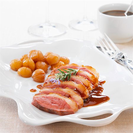simsearch:652-07656232,k - Duck magret with pan-fried chestnuts Photographie de stock - Rights-Managed, Code: 825-07078409