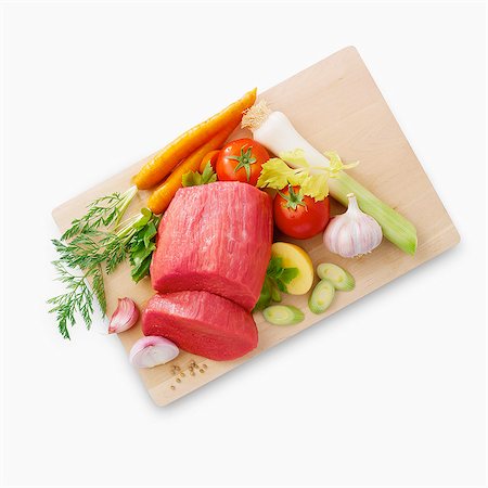 simsearch:825-07076578,k - Piece of raw meat and vegetables Foto de stock - Con derechos protegidos, Código: 825-07078400