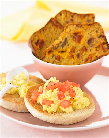simsearch:825-07076952,k - Scrambled eggs on toasted muffins and chorizo savoury cake Stock Photo - Rights-Managed, Code: 825-07522202