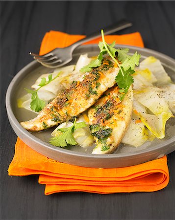 simsearch:652-05807965,k - Sea bream fillets with orange zests and chicory Photographie de stock - Rights-Managed, Code: 825-07522458