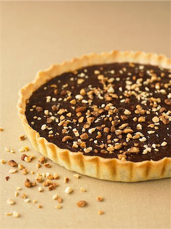 simsearch:825-07522604,k - Chocolate and almond tart Stock Photo - Rights-Managed, Code: 825-07522672