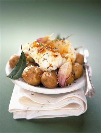 Monkfish roasted with thyme and Grenaille potatoes Stock Photo - Rights-Managed, Code: 825-07522721