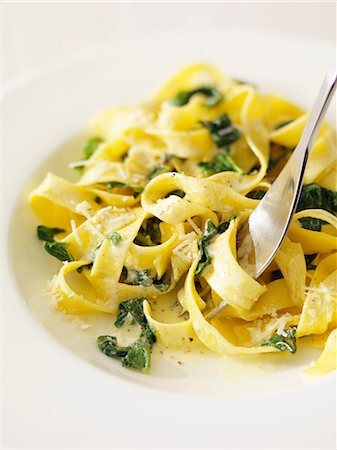 Tagliatelles with spinach and grated cheese Stock Photo - Rights-Managed, Code: 825-07522787