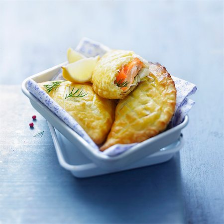 Two salmon and leek turnovers Foto de stock - Con derechos protegidos, Código: 825-07522799