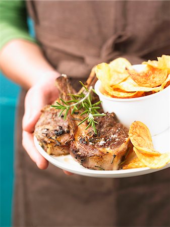 Grilled lamb chops with rosemary and crisps Stock Photo - Rights-Managed, Code: 825-07522881