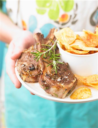 Grilled lamb chops with rosemary and crisps Stock Photo - Rights-Managed, Code: 825-07522899