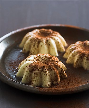 entremets - Panna cotta sprinkled with cocoa Stock Photo - Rights-Managed, Code: 825-07522967