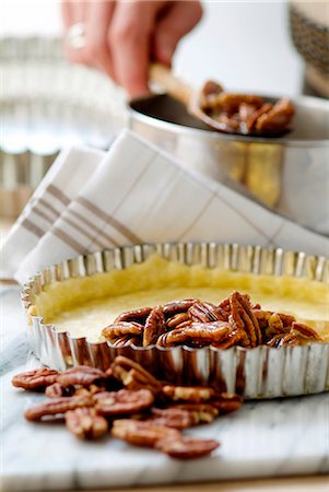 Preparing a pecan pie Stock Photo - Rights-Managed, Code: 825-07599447