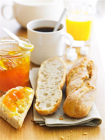 simsearch:652-03802994,k - Breakfast with coffee,orange juice ,bread and jam Stock Photo - Rights-Managed, Code: 825-07599661