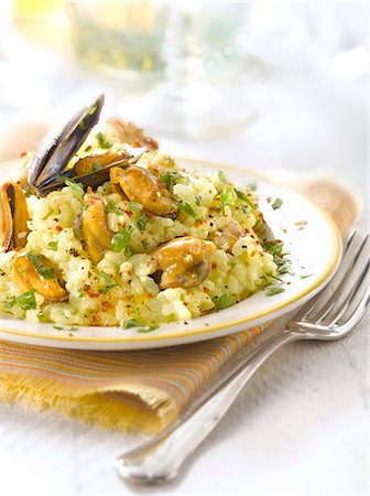 seafood risotto - Risotto with mussels and saffron Stock Photo - Rights-Managed, Code: 825-07649153