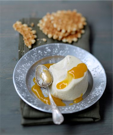 desserts with fruit sauces - Petit-suisse panna cotta with mango puree Stock Photo - Rights-Managed, Code: 825-07649256