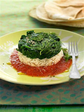 Basmati rice and spinach timbale with tomato sauce Stock Photo - Rights-Managed, Code: 825-07652690