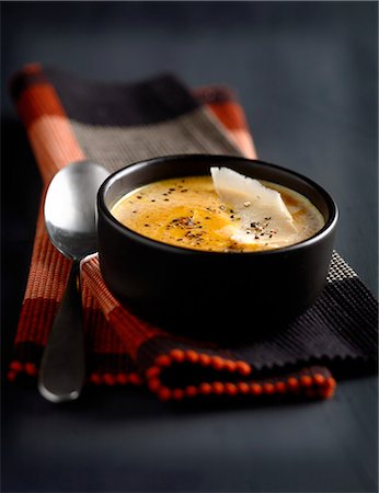 simsearch:652-05809619,k - Cream of pumpkin soup with parmesan flakes Stock Photo - Rights-Managed, Code: 825-07652780